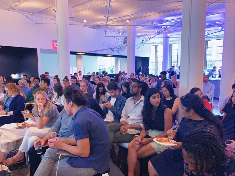 A packed room of strategists listening at going rogue with research